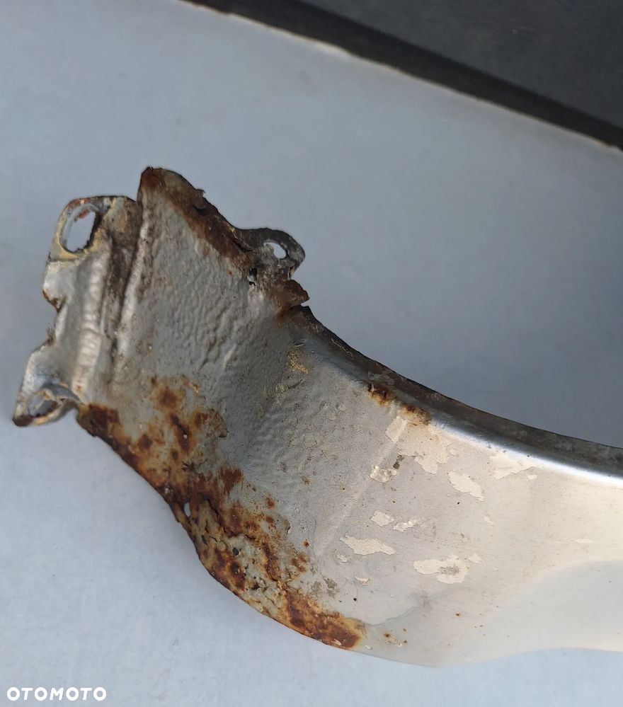 BŁOTNIK PRZEDNI LEWY - OPEL CORSA D /  SREBRNY-Z157 - 2