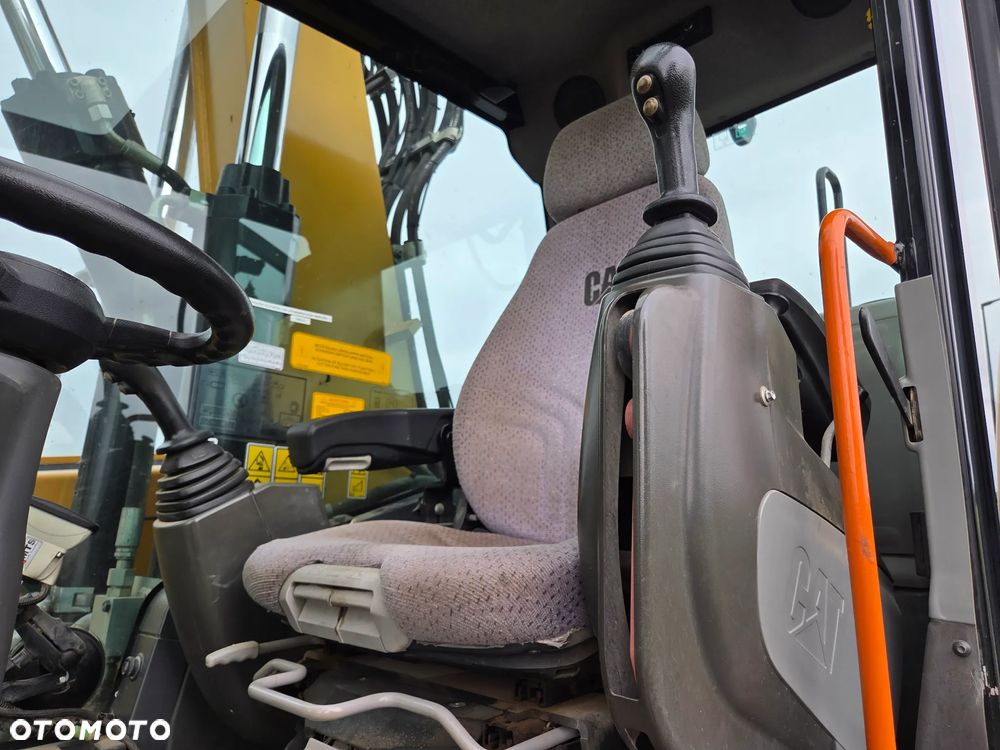 Caterpillar M318F / z Niemiec / - 9