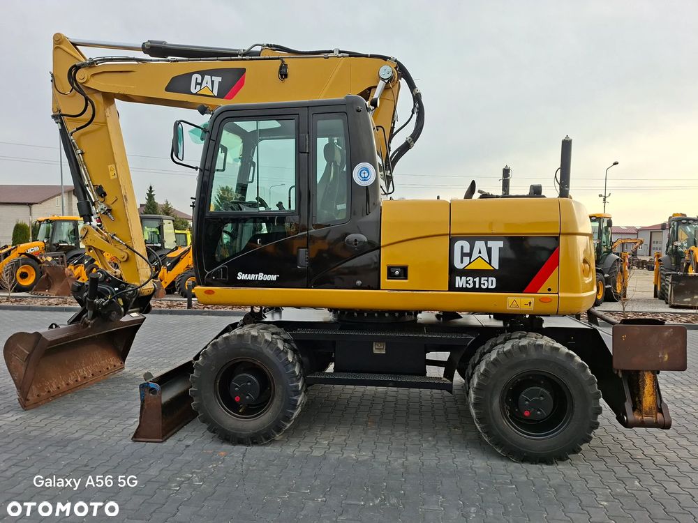 Caterpillar CAT M315D rok 2012 - 10