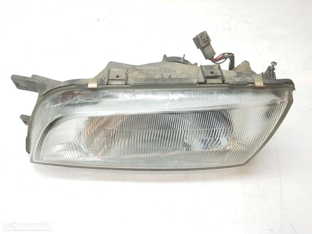 FAROL ESQUERDO NISSAN ALMERA N15 - 1
