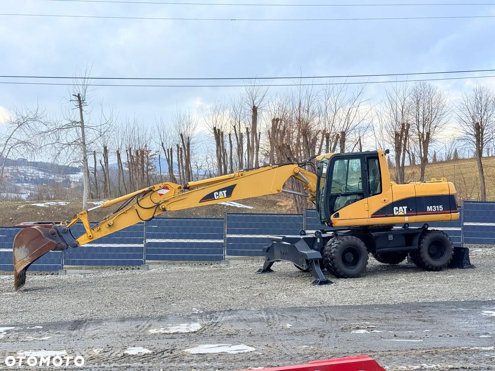 Caterpillar CAT M315C  CATERPILLAR SPROWADZONY  Bardzo Dobry Stan - 19