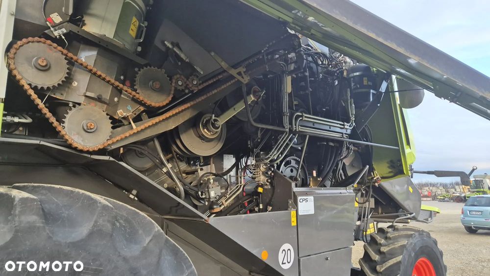 Claas Lexion 620 z hederem - 13