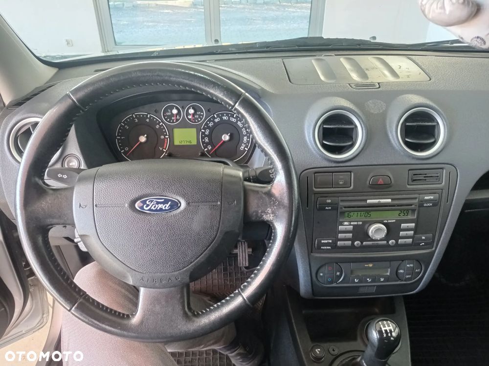 Ford Fusion 1.4 + - 9