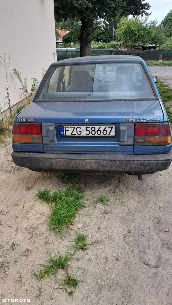 Maska drzwi lampy Toyota Corolla e8 - 2