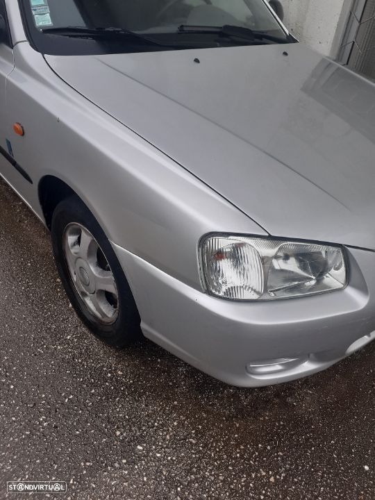Guarda lamas hyundai accent ano 2002 - 3