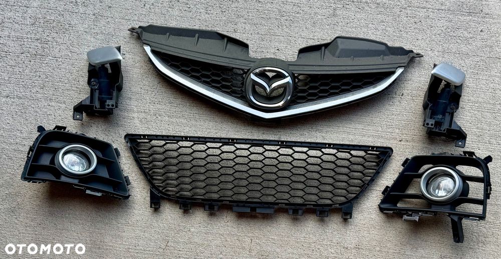 Mazda 5 CR Lift 2008/2010r Grill atrapa kratka środkowa zderzak spryskiwacz lampy przed stan b.dobry Europa zwykle i xenon ksenon ślizg wygłuszenie maski zderzak zaślepka haka pompka spryskiwaczy  spryskiwacze lamp  halogeny kratki  Grill osłoną silnika przetwornica błotnik belka wzmocnienie i dużo innych Czesci do mazdy 5 CR !!! - 1