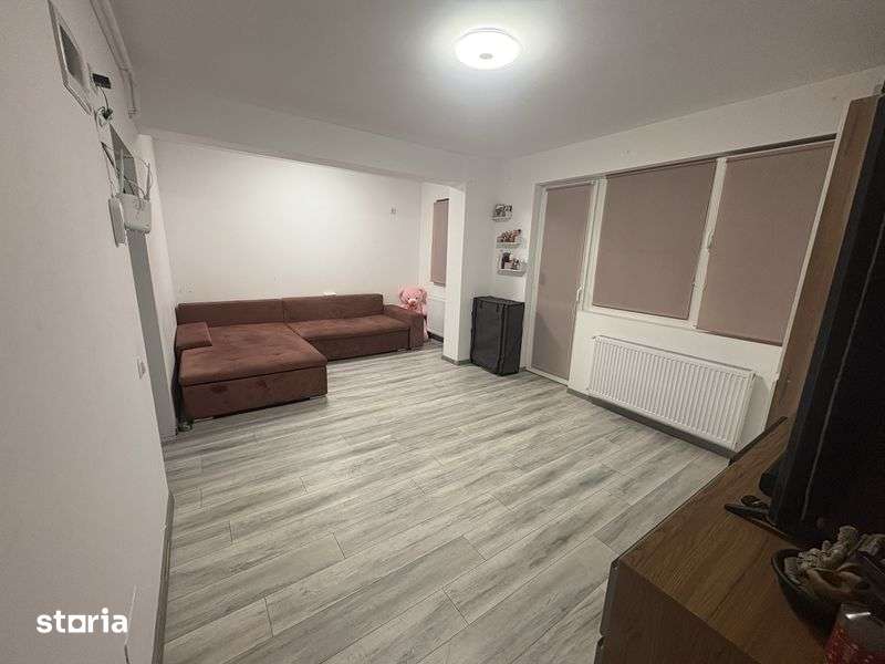 Garsoniera decomandata 33m patrati +gradina 36m patrati+loc de parcare — fotografia 1