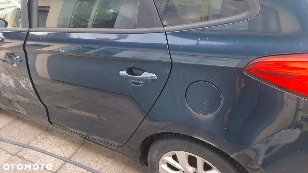 Kia Carens - 8