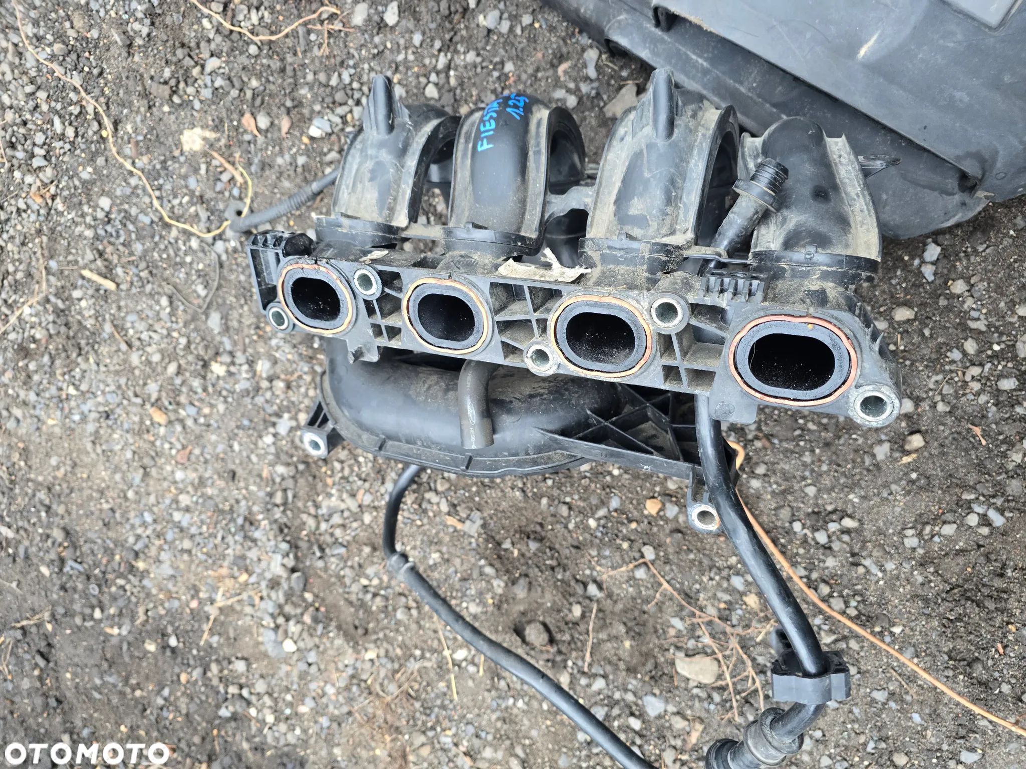 Kolektor ssący ford Fiesta mk7 1.25 - 1