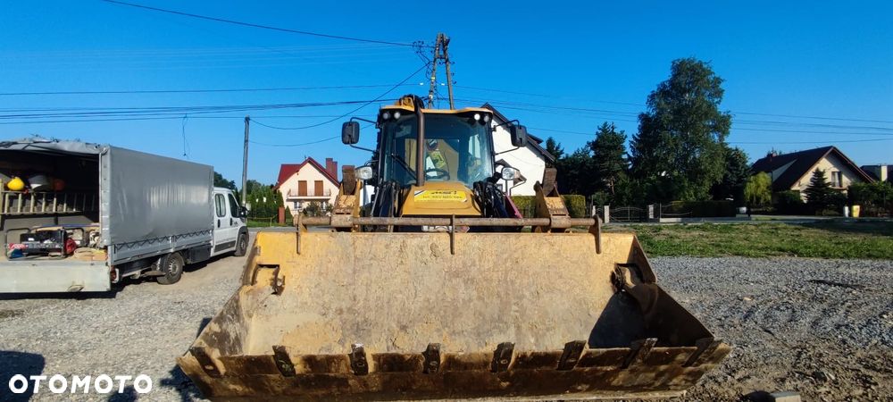 Caterpillar 428 - 2