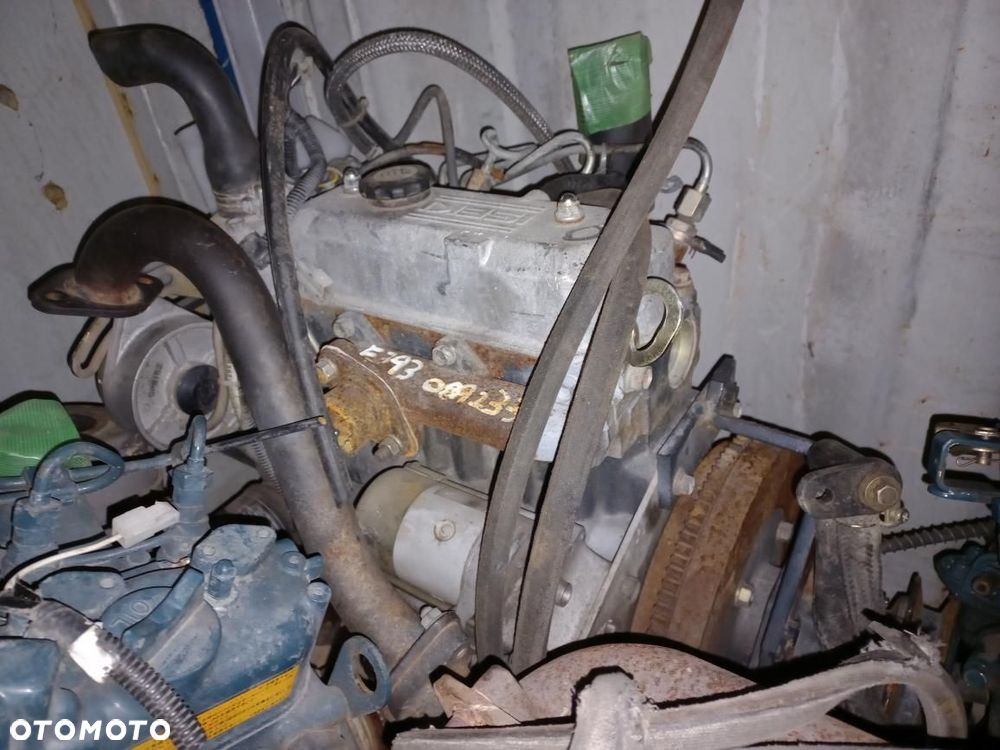 Silnik kubota V3800-DI-T-ET10, 7KBXL,BKBXL03,blok,głowica,turbo,wał,korbowód,tłok,koło rozrządu,zamachowe,wałek,1G5970461,TD04 HL,1G574,V33,V3600,V3800,D662,ISEKI,YANMAR,wtryski,pompa wtryskowa,kompletny silnik,obudowa,E4CG,C18W,V1505D. - 18