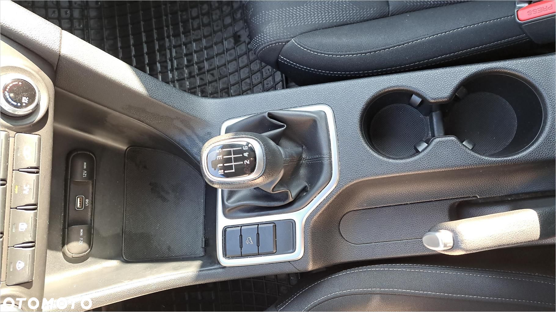 Kia Sportage - 14