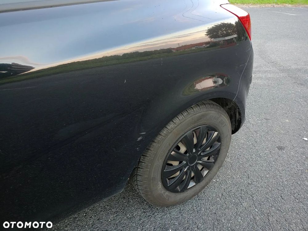 Opel Corsa 1.2 16V Enjoy - 13