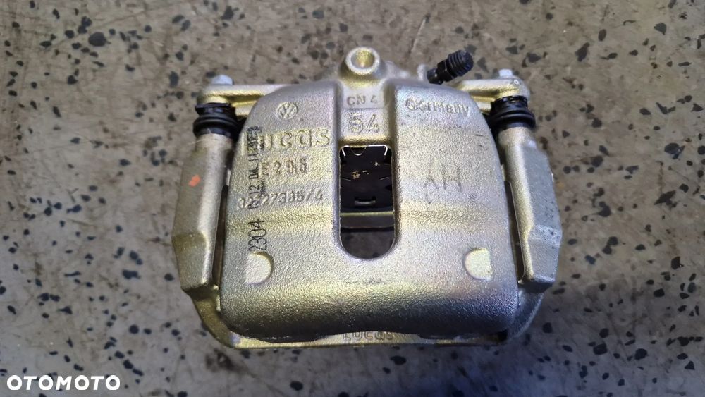 AUDI SEAT SKODA VOLKSWAGEN ZACISK HAMULCOWY LEWY PRZÓD 32327385/4 - 1