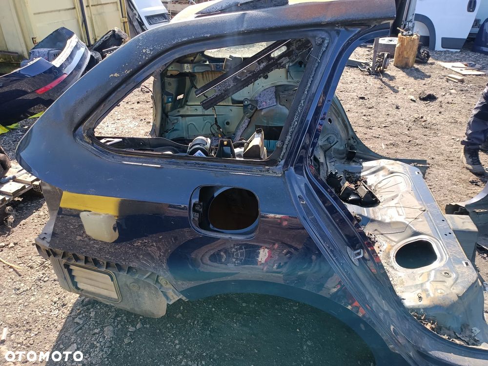 BŁOTNIK PRAWY TYŁ SKODA OCTAVIA III KOMBI - 1