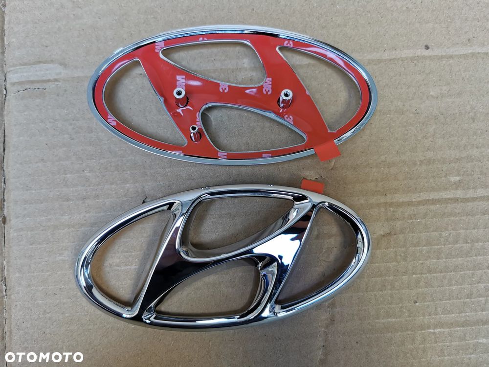 Hyundai Kona EV Emblemat znaczek logo przód 16x8cm 86354-4000 - 1