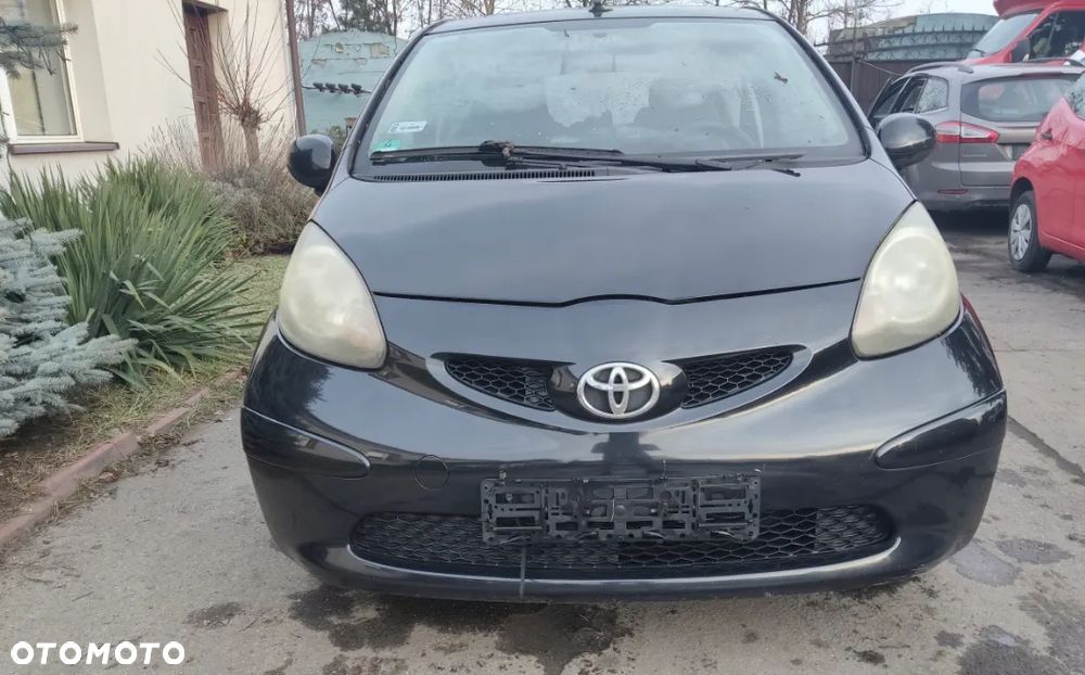 TOYOTA AYGO I MASKA ZDERZAK LAMPY PAS PRZEDNI KOMPLET EU LAKIER 211 - 2