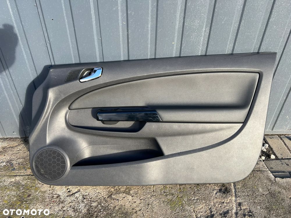 Tapicerka drzwi klamka lewa prawa Opel Corsa D 3-drzwi - 1