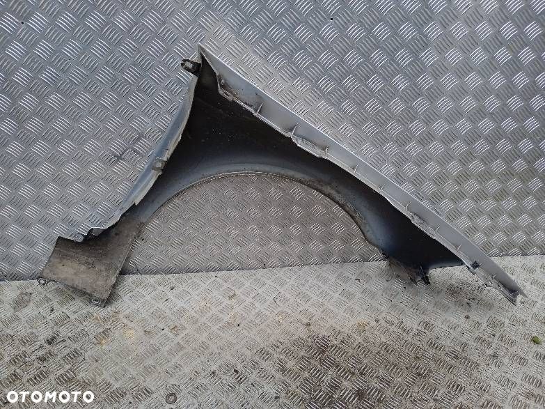 BŁOTNIK LEWY PRZEDNI RENAULT LAGUNA 2 - 2