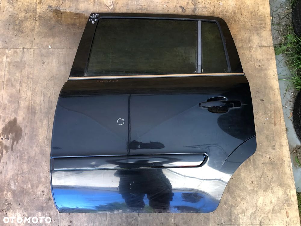 A56. Drzwi Lewy Tył Opel Zafira B Czarne 2006R (2005–2014) - Wysyłka - 10