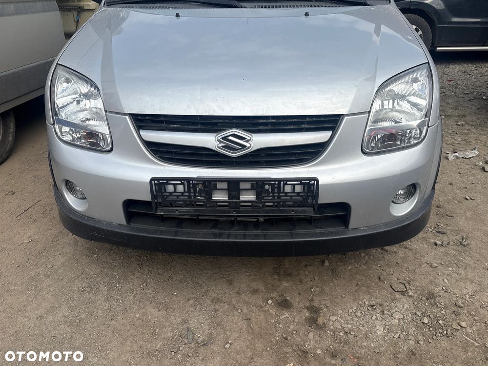 ZDERZAK PRZEDNI PRZÓD SUZUKI IGNIS 2006R KOD LAKIERU ZCC - 1