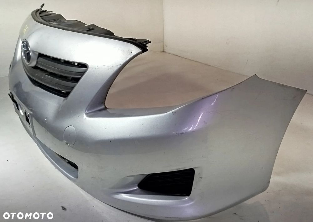 zderzak przedni przód grill TOYOTA COROLLA E15 07-10 1F7 - 2