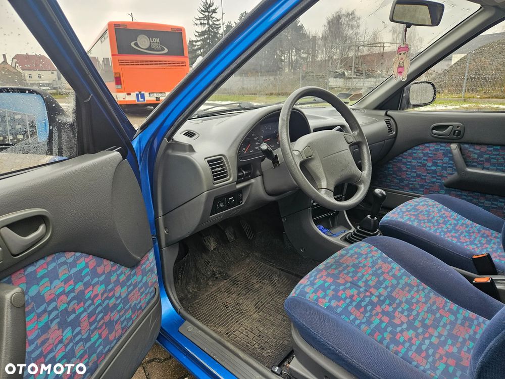 Suzuki Swift 1.0 GLX - 7