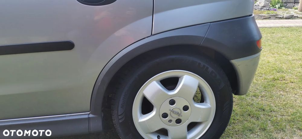 Opel Corsa 1.2 16V Enjoy - 8