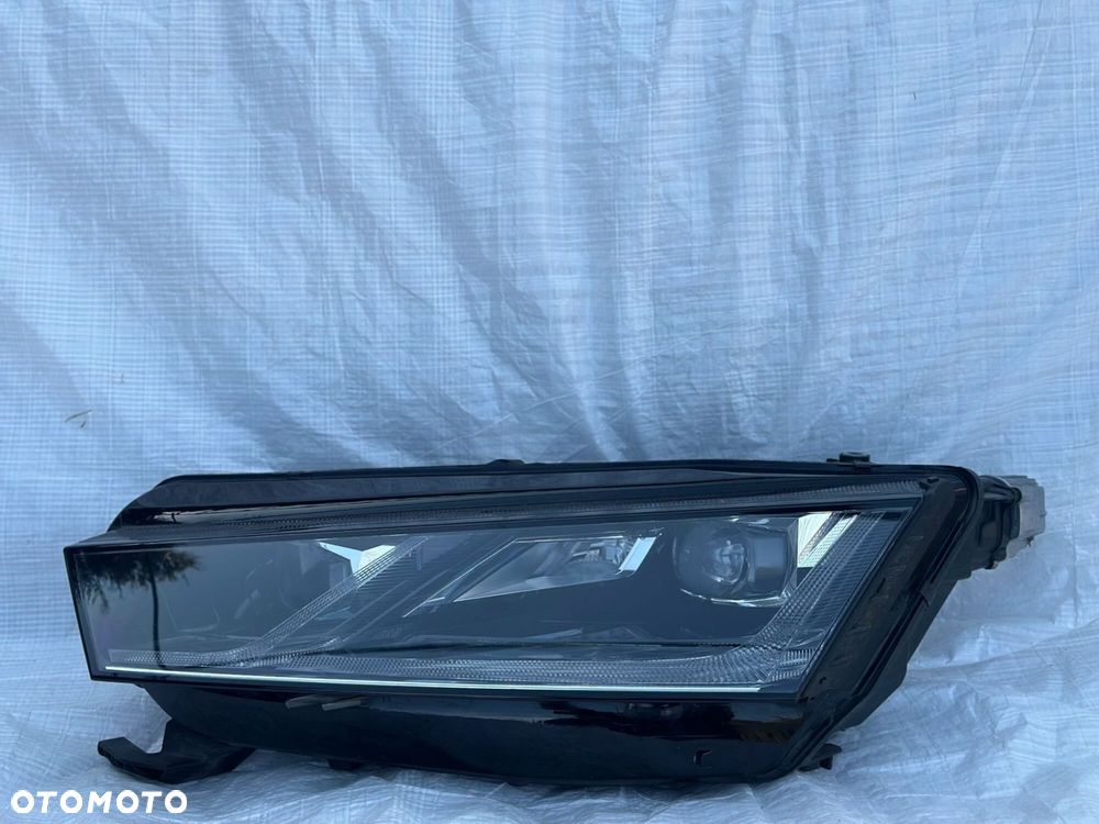 LAMPA LEWA PRZÓD SKODA OCTAVIA 4 IV 5E4941015A - 2