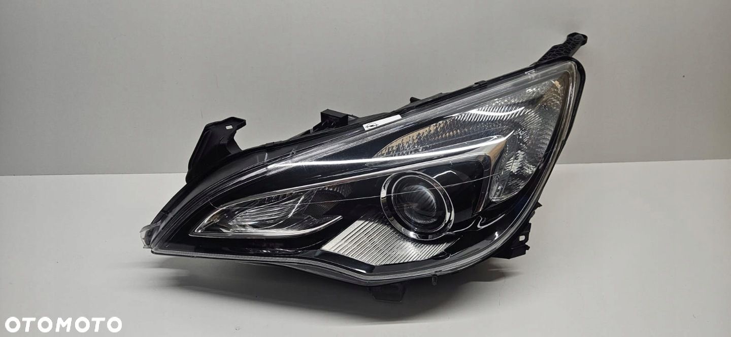 OPEL ASTRA IV 4 J GTC REFLEKTOR LEWY SOCZEWKA ZWYKŁA LAMPA - 1