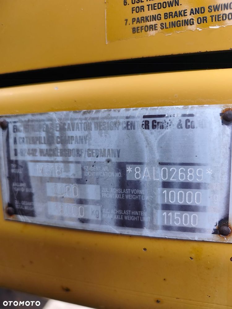 Caterpillar M318 - 8