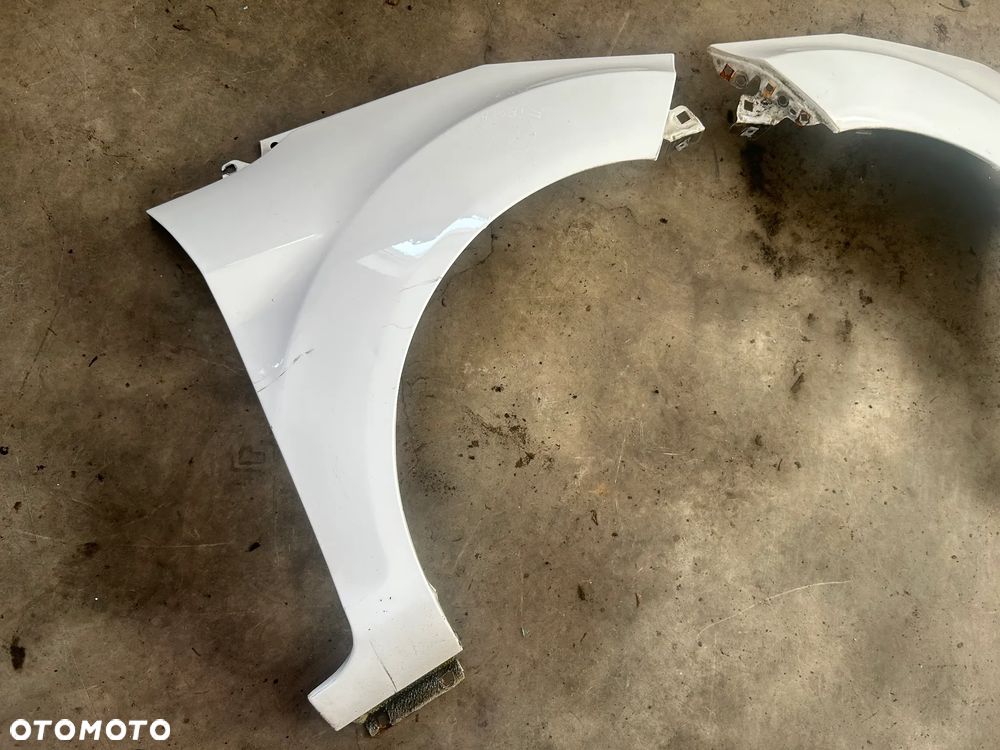 BŁOTNIK LEWY PRAWY PRZÓD FORD FIESTA MK7 - 2