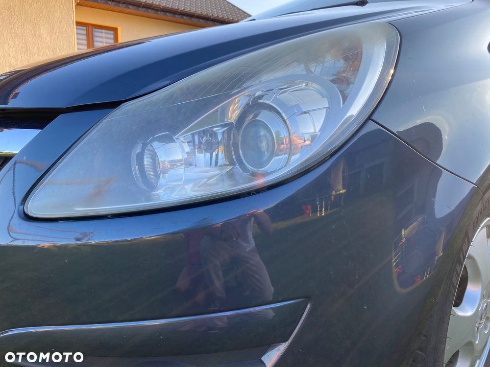 Opel Corsa 1.2 16V Enjoy - 12