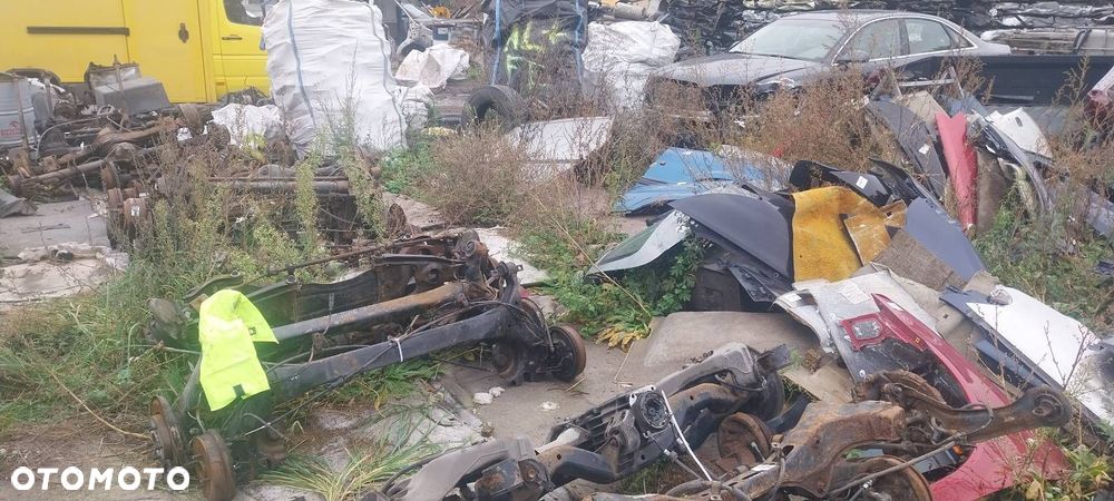 BELKA OŚ ZAWIESZENIA TYŁ BĘBNY Z ABS MITSUBISHI COLT VI HB 5D - 6