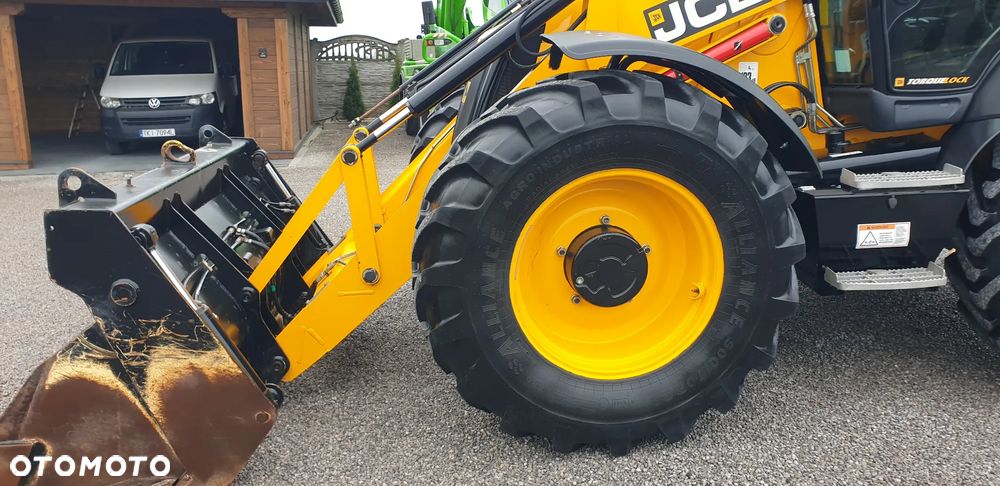 JCB 4CX eco STAN IDEALNY!! TYLKO 5920MTG/ rok 2013 /TORQUELOCK/DŻOJSTIKI/POWERSLIDE - 25