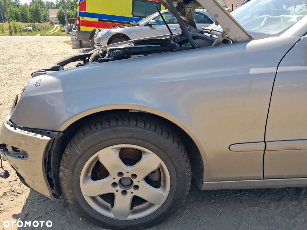 BLOTNIK LEWY PRZOD MERCEDES E KLASA W211 723 - 1
