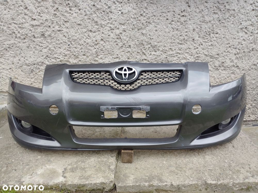 ZDERZAK PRZÓD PRZEDNI TOYOTA AURIS E15 07/10r - 2