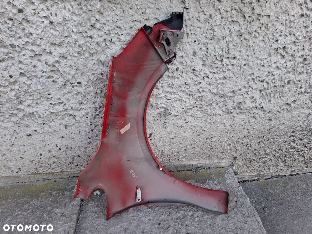 BŁOTNIK PRZEDNI LEWY OPEL ASTRA IV J Z50B - 7