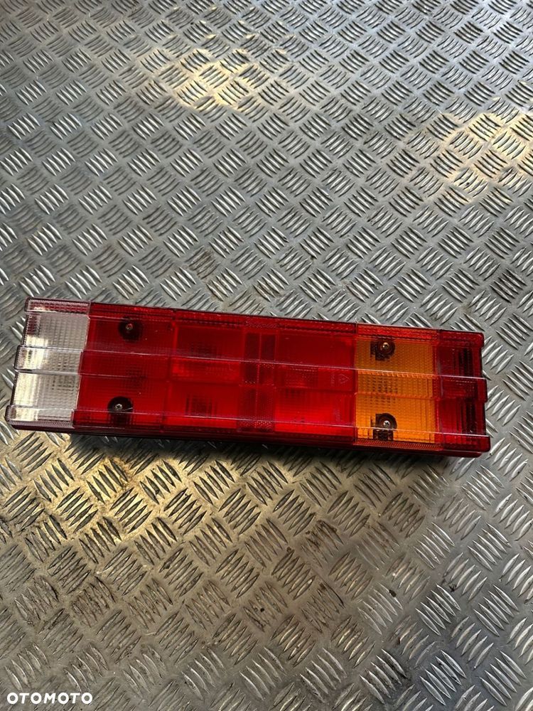 MERCEDES ATEGO LAMPA TYLNA PRAWA ORYGINAŁ 1998- OE A0025449703 - 1