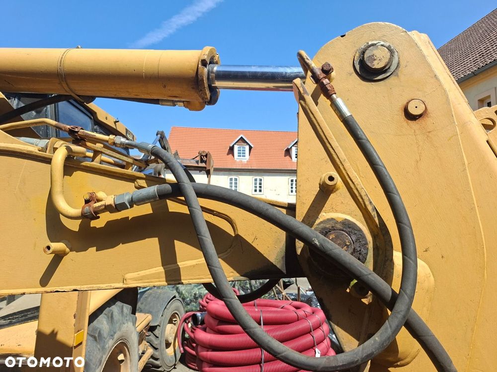 Caterpillar 428 C 4X4 - 37