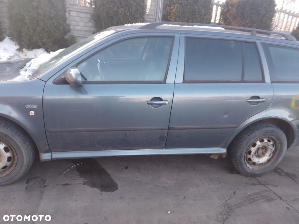 SKODA OCTAVIA I  00-10 1.6 BFQ     OSŁONA PRZECIWSŁONECZNA PRAWA LEWA - 12