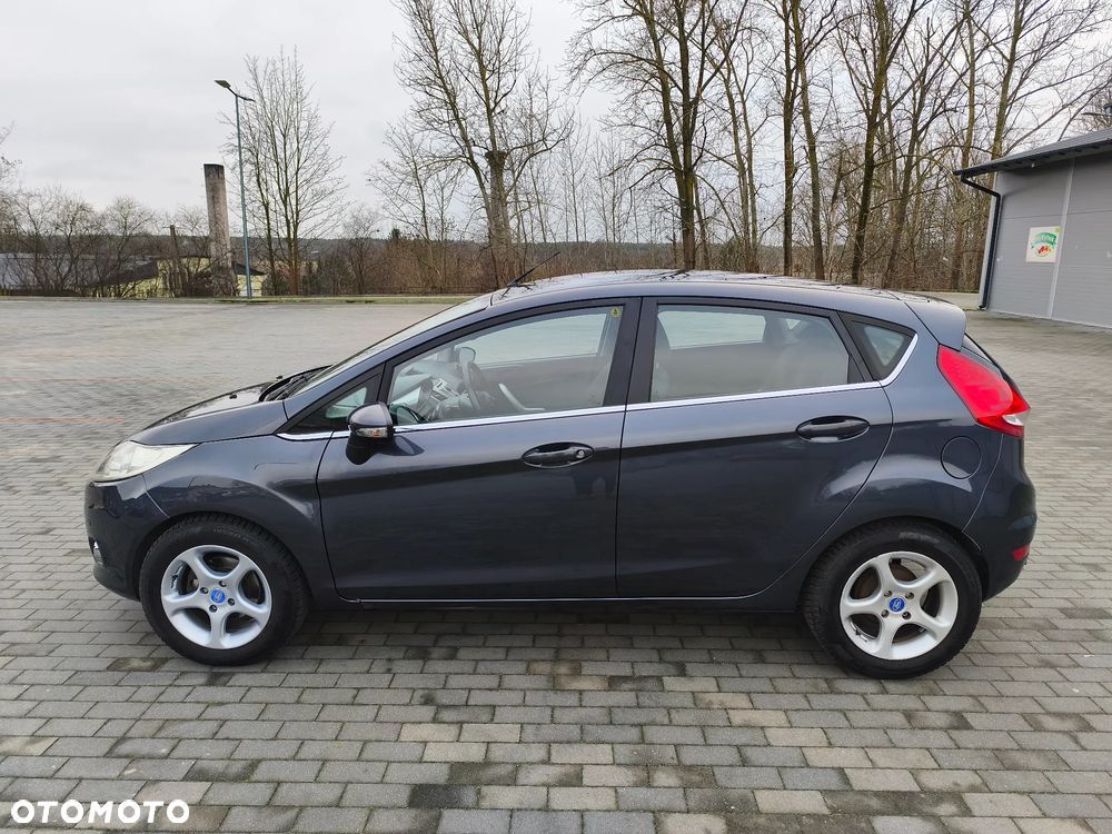 Ford Fiesta 1.25 Ghia - 11