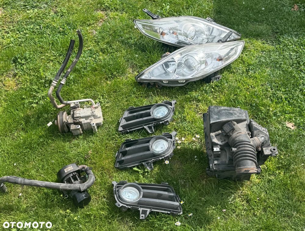 Mazda 5 CR 2005/2007 i 2008/2010r zderzak przedni tylny maska błotnik wzmocnienie belka chłodnice stan b.dobry Europa zwykle i xenon ksenon gołe i kompletne !!! Posiadam również zbiorniczki spryskiwaczy  spryskiwacze lamp  halogeny kratki  Grill i dużo innych Czesci do mazdy 5 CR !!! - 27