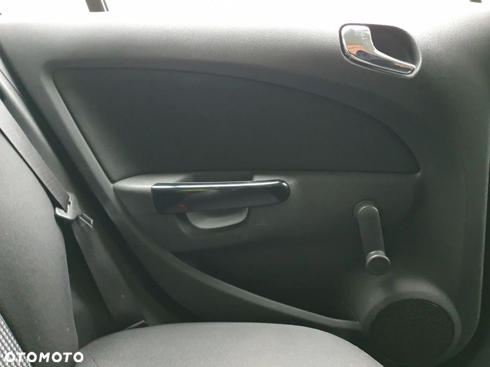 Opel Corsa 1.2 16V Enjoy - 21