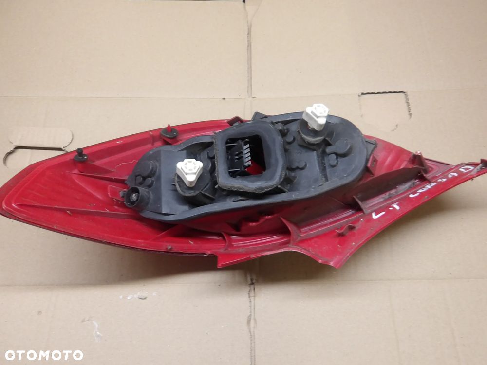 OPEL CORSA D 3D 06-10 LAMPA PRAWA LEWA TYŁ TYLNA 13186350 - 3