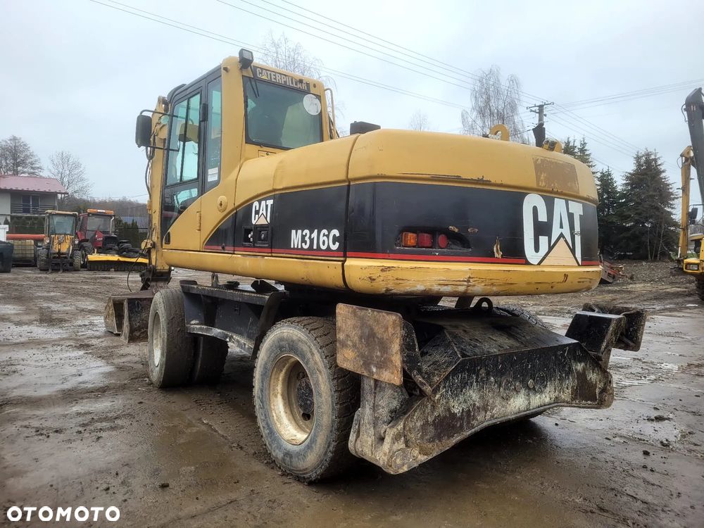 Caterpillar M316C - 3
