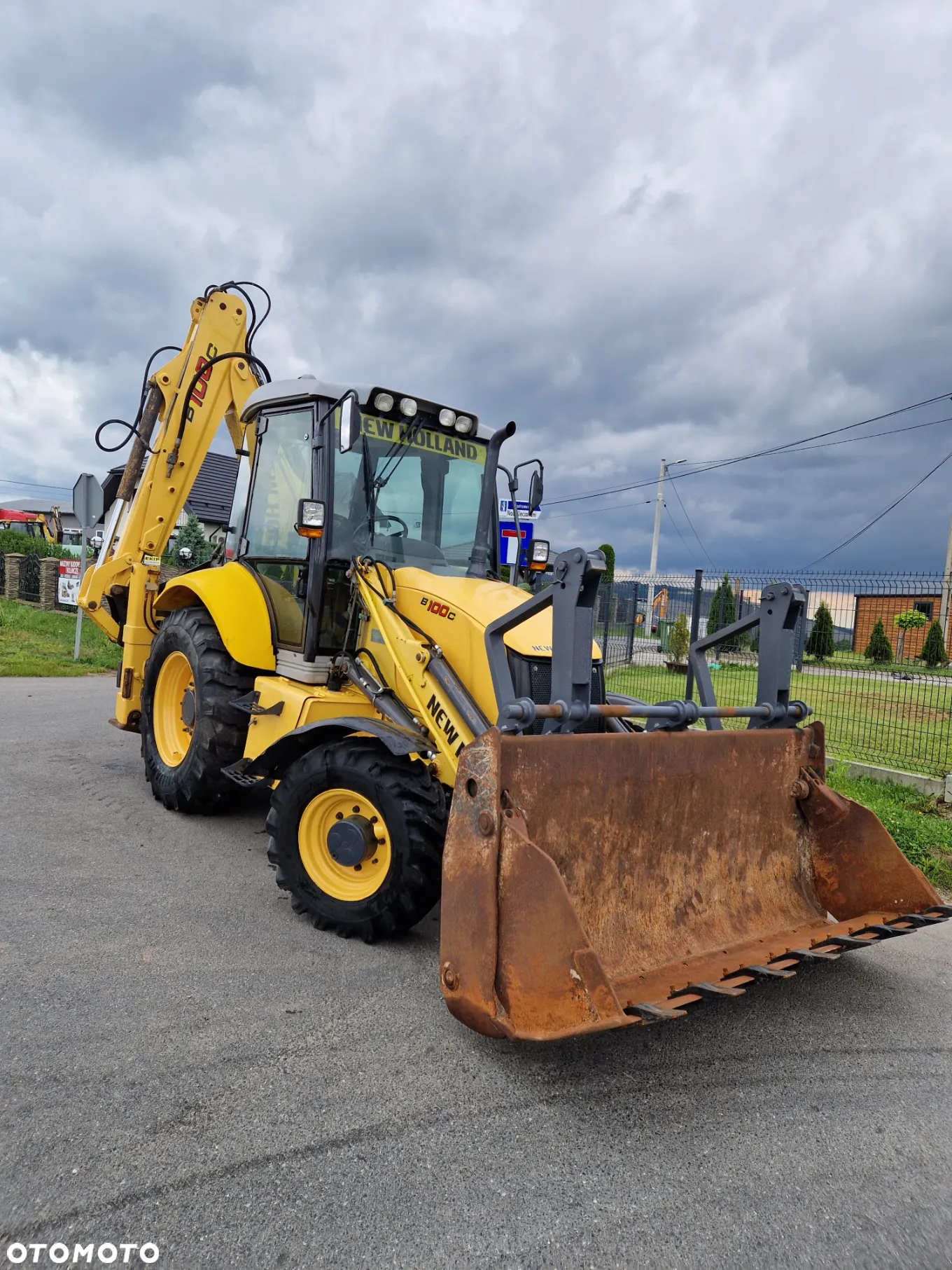 New Holland B100C - 7