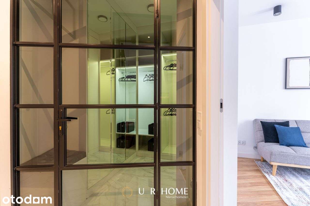 Elegancki apartament z garderobą, garażem i komórk