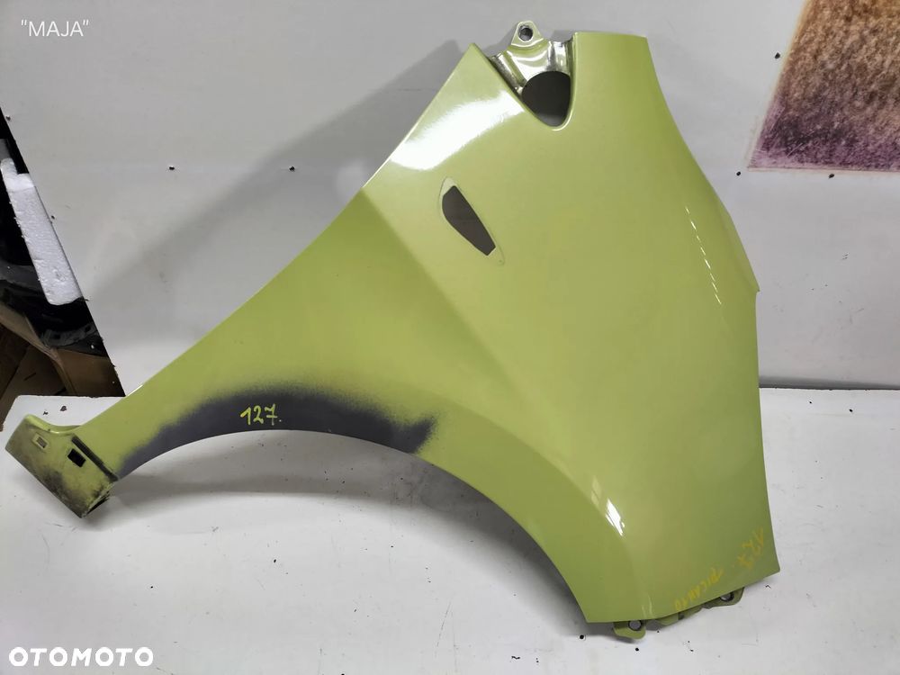 KIA PICANTO BŁOTNIK PRZEDNI PRAWY PRZÓD