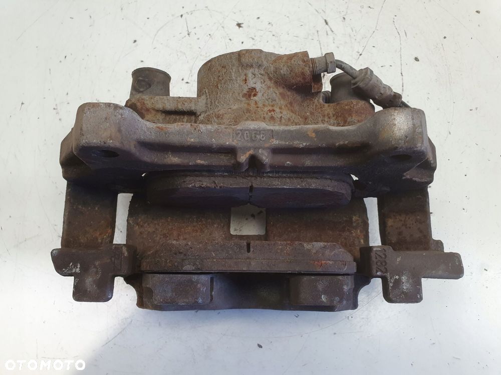 Volvo S60 II V60 I PRZEDNI ZACISK HAMULCOWY prawy przód pasażera 31471664 - 8